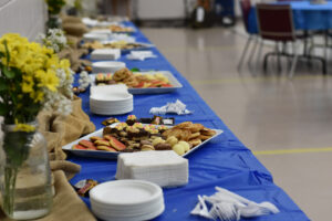 Desserts on a table in a gym